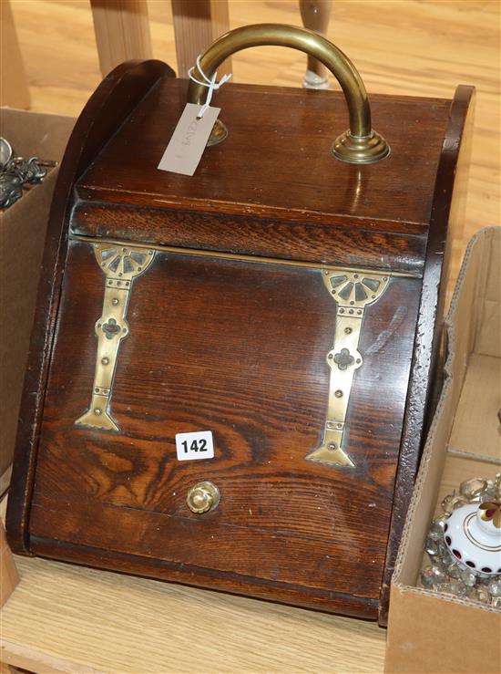 A Victorian mahogany coal scuttle and scoop